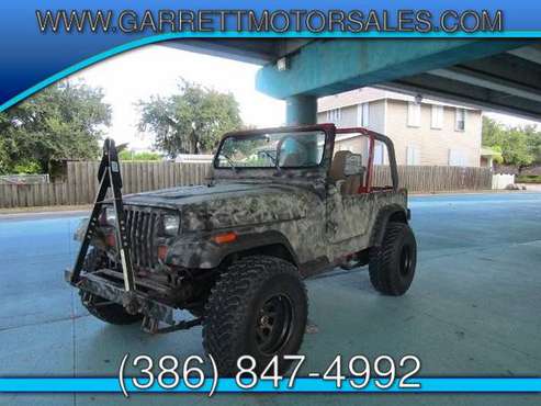 1995 Jeep Wrangler manual trans lifted near new tires low mi for sale in New Smyrna Beach, FL