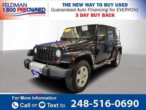 2011 *Jeep* *Wrangler* Unlimited Sahara suv Black Clearcoat for sale in Waterford Township, MI