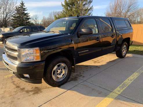 Four-wheel drive 2011 Chevy Silverado - cars & trucks - by owner -... for sale in bay city, MI