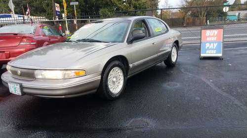 APPROVED with NO CREDIT CHECKS! 1996 Chrysler LHS Low Miles and... for sale in Springfield, OR