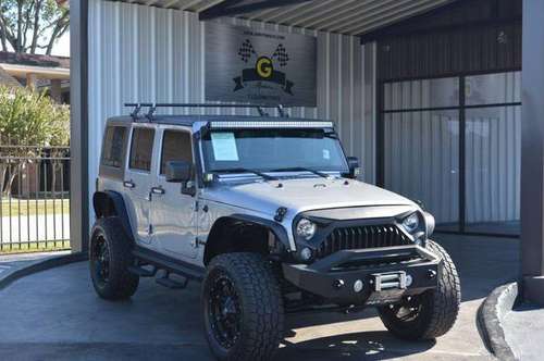 2014 Jeep Wrangler Unlimited Sahara 4x4 4dr SUV - cars & trucks - by... for sale in Houston, TX