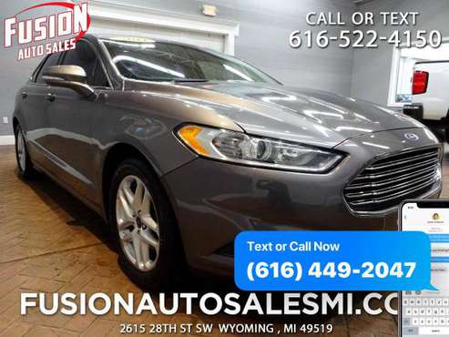 2014 Ford Fusion 4dr Sdn SE FWD - We Finance! All Trades Accepted!!... for sale in Wyoming , MI