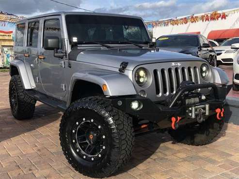 2014 Jeep Wrangler Unlimited S Unlimited Sahara - cars & trucks - by... for sale in TAMPA, FL