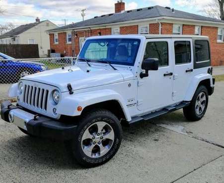 ALMOST NEW 2017 JEEP SAHARA UNLIMITED - cars & trucks - by owner -... for sale in Westland, MI