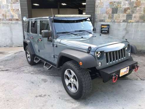 2014 Jeep Wrangler Unlimited Sport SUV 4D - cars & trucks - by... for sale in Omaha, NE