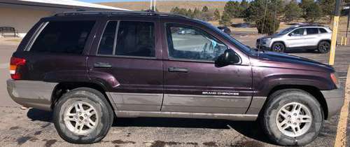 2004 JEEP GRAND CHEROKEE LAREDO - cars & trucks - by owner - vehicle... for sale in Colorado Springs, CO