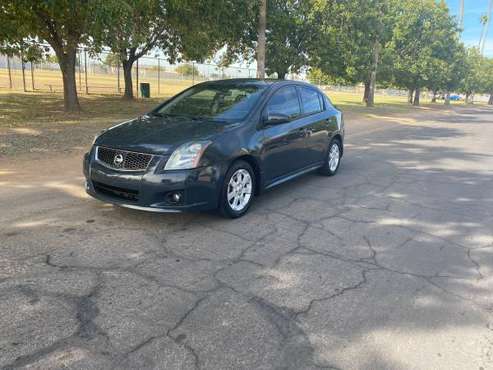 2009 Nissan Sentra, 4clyinder, GAS SAVER! - cars & trucks - by owner... for sale in Phoenix, AZ
