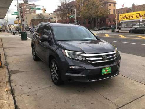 2017 Honda Pilot Touring SUV - cars & trucks - by dealer - vehicle... for sale in Jamaica, NY