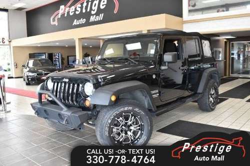 2013 Jeep Wrangler Unlimited Sport - cars & trucks - by dealer -... for sale in Cuyahoga Falls, OH