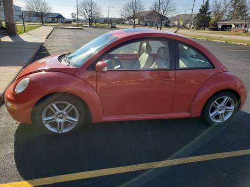 2004 Orange 🍊 Volkswagen Beetle 116,000 miles - cars & trucks - by... for sale in Oshkosh, WI
