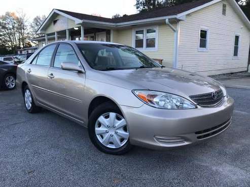 2004 Toyota Camry LE - cars & trucks - by dealer - vehicle... for sale in Grayson, GA