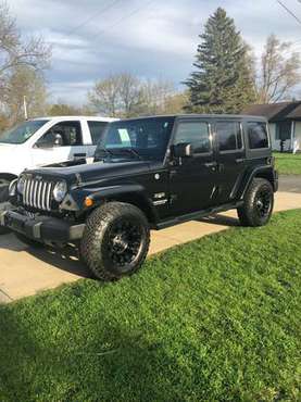 2016 Jeep Wrangler Unlimited Sahara for sale in Carson City, MI