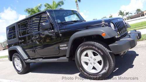 2015 *Jeep* *Wrangler Unlimited* *Sport* Black Clear - cars & trucks... for sale in West Palm Beach, FL