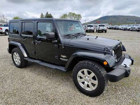 2013 Jeep Wrangler Unlimited Sahara - - by dealer for sale in Chillicothe, OH