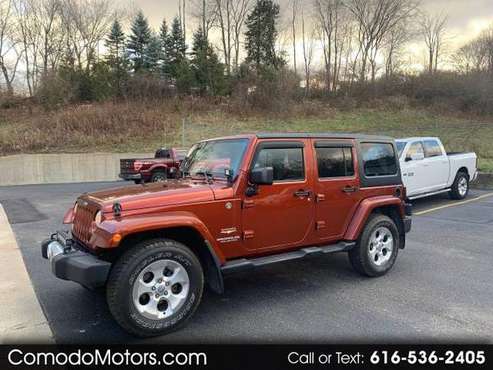 2014 Jeep Wrangler Unlimited Sahara 4WD - cars & trucks - by dealer... for sale in Caledonia, MI