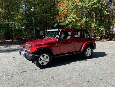 2012 Red Rock Jeep Wrangler Unlimited Sahara - cars & trucks - by... for sale in Pompton Plains, NJ