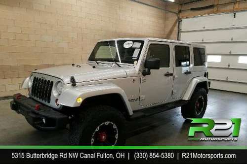 2012 Jeep Wrangler Unlimited Sahara 4WD Your TRUCK Headquarters! We for sale in Canal Fulton, OH