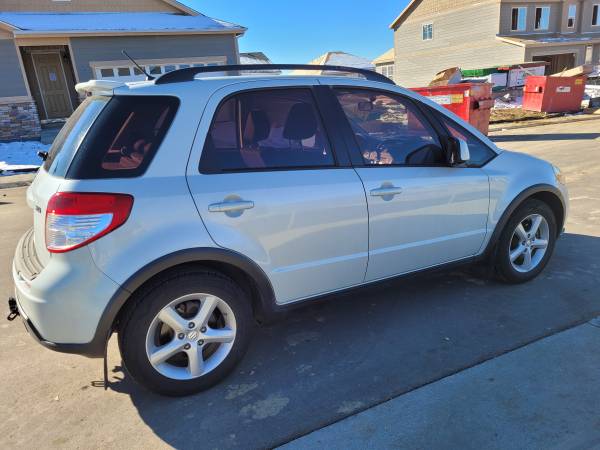 2009 SUZUKI SX4.NICE COMMUTE CAR FOR A STUDENT. LOW MILES - cars &... for sale in Aurora, CO – photo 3