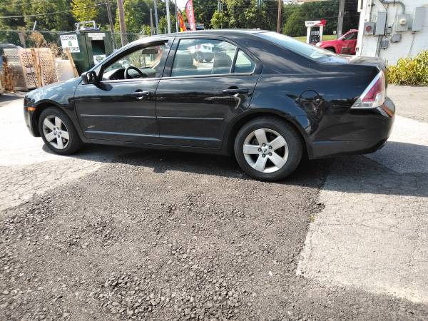 06 black fusion with sunroof - cars & trucks - by dealer - vehicle... for sale in Vails Gate, NY – photo 2