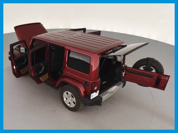 2012 Jeep Wrangler Unlimited Sahara Sport Utility 4D suv Red for sale in Cleveland, OH – photo 17