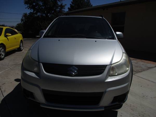 2009 suzuki sx4, awd, manual only 105k miles - cars & trucks - by... for sale in Saint George, UT – photo 3