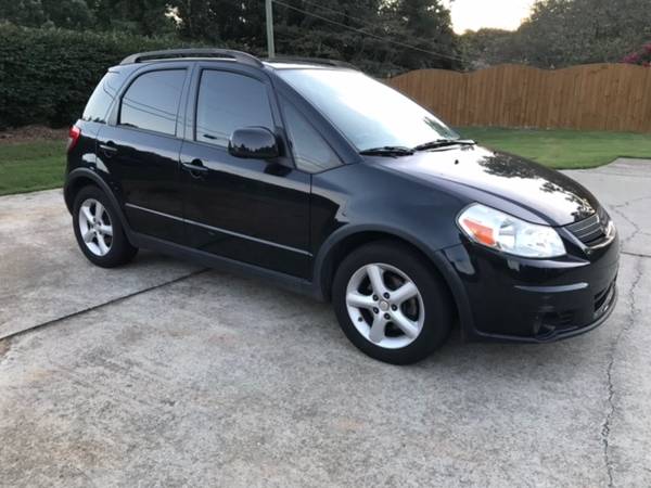 2009 SUZUKI SX4--Clean Solid Car--"One Owner" Priced to Sell - cars... for sale in Buford, GA – photo 4