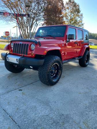 Lifted 11 Jeep Wrangler Unlimited Sahara 4x4 loaded! - cars & trucks... for sale in Easley, SC – photo 10
