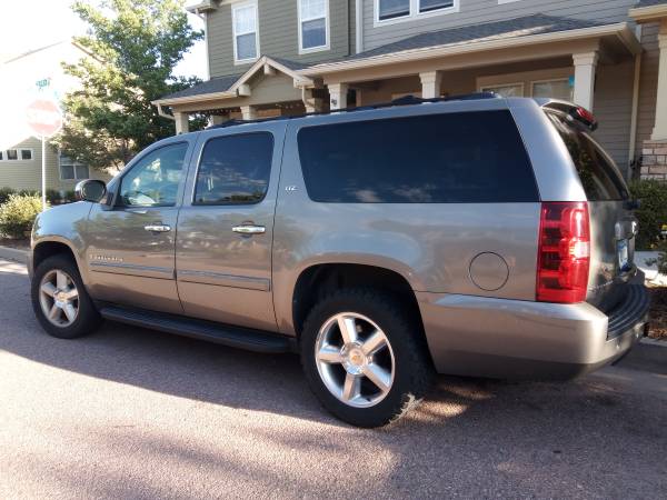 Suburban with 18K miles on new Engine - cars & trucks - by owner -... for sale in Colorado Springs, CO – photo 6