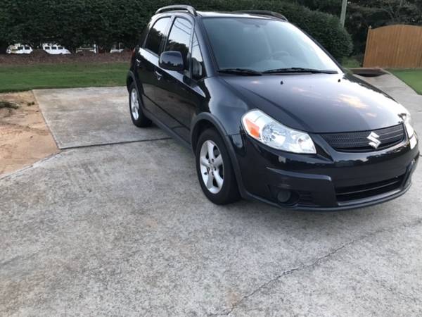 2009 SUZUKI SX4--Clean Solid Car--"One Owner" Priced to Sell - cars... for sale in Buford, GA – photo 3