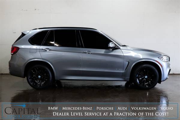 Blacked Out V8 BMW X5 50i w/445hp V8, 20" Rims! - cars & trucks - by... for sale in Eau Claire, WI – photo 2