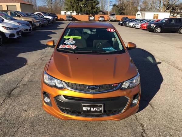 2018 Chevy Chevrolet Sonic LT hatchback Orange - cars & trucks - by... for sale in Mansfield, OH – photo 2