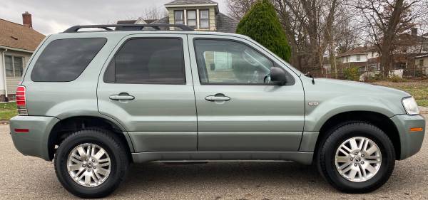 2006 Mercury Mariner Premier 4WD - cars & trucks - by owner -... for sale in Barberton, OH – photo 4