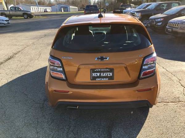 2018 Chevy Chevrolet Sonic LT hatchback Orange - cars & trucks - by... for sale in Mansfield, OH – photo 4