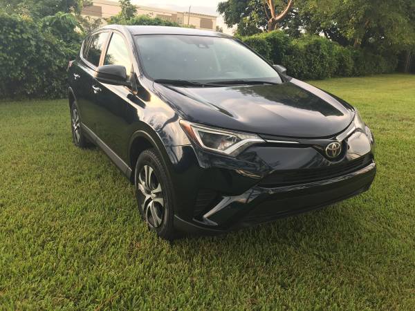 2018 Toyota RAV4 - cars & trucks - by owner - vehicle automotive sale for sale in Lake Worth, FL – photo 7