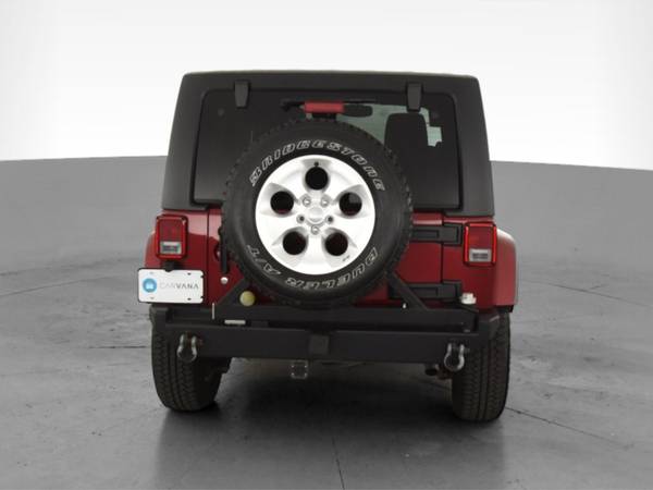 2013 Jeep Wrangler Unlimited Sahara Sport Utility 4D suv Red -... for sale in Alexandria, MD – photo 9