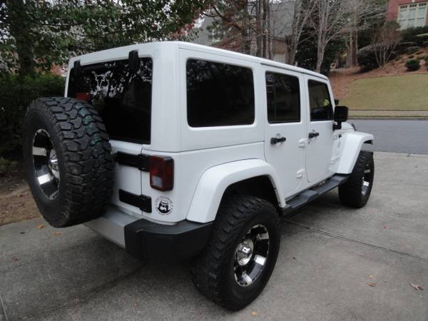 2012 Jeep Wrangler Sahara Unlimited - cars & trucks - by owner -... for sale in Lawrenceville, GA – photo 4