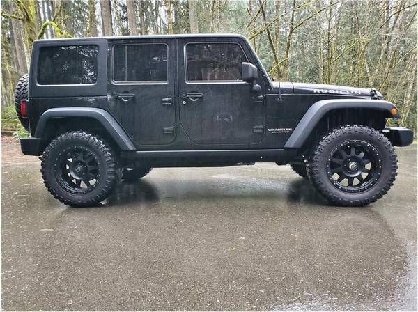 2013 Jeep Wrangler Unlimited Rubicon 6-Spd Manual Lifted - cars & for sale in Bremerton, WA – photo 4