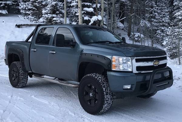 Lifted 2007 Chevy Silverado LTZ - cars & trucks - by owner - vehicle... for sale in Santa Fe, NM – photo 2