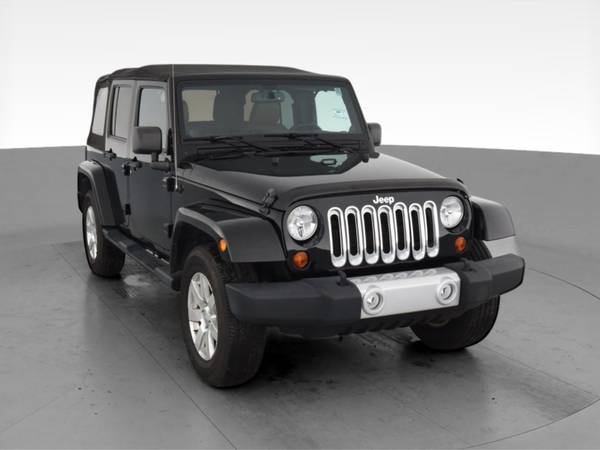 2013 Jeep Wrangler Unlimited Sahara Sport Utility 4D suv Black - -... for sale in Fort Collins, CO – photo 16