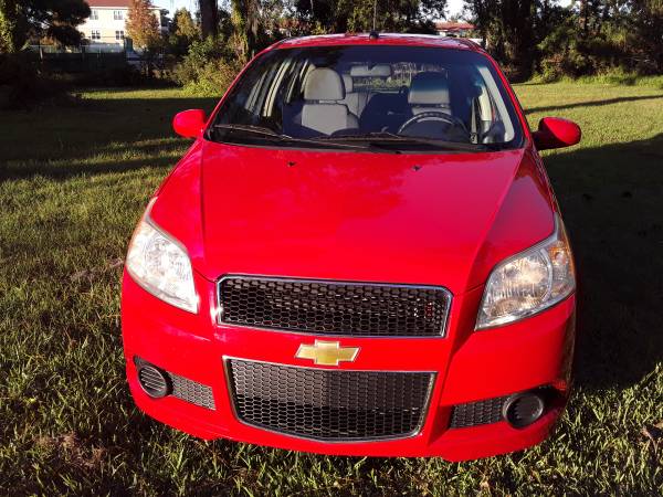 Only 15K Miles Just like new Chevy Aveo - - by dealer for sale in Holiday, FL – photo 2