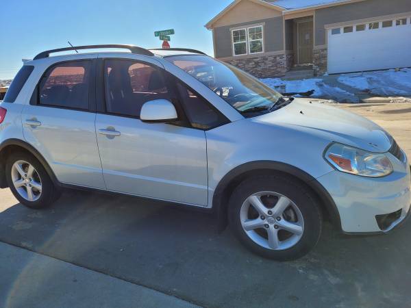 2009 SUZUKI SX4.NICE COMMUTE CAR FOR A STUDENT. LOW MILES - cars &... for sale in Aurora, CO – photo 4