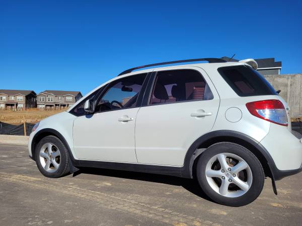 2009 SUZUKI SX4.NICE COMMUTE CAR FOR A STUDENT. LOW MILES - cars &... for sale in Aurora, CO – photo 5