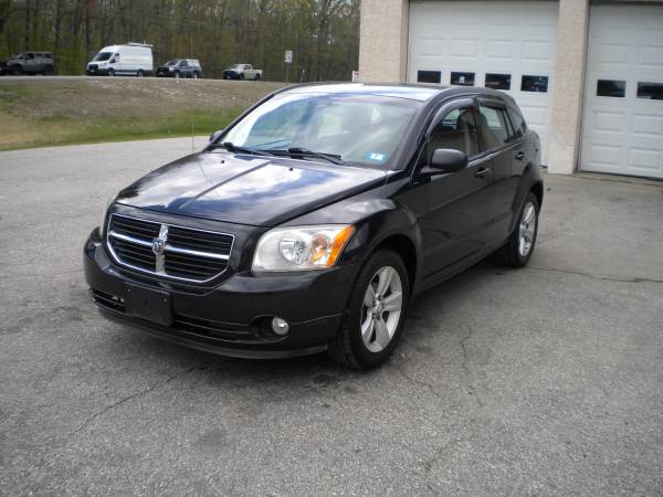 Dodge Caliber Extra Clean and Great on Gas 1 Year Warranty for sale in Hampstead, ME