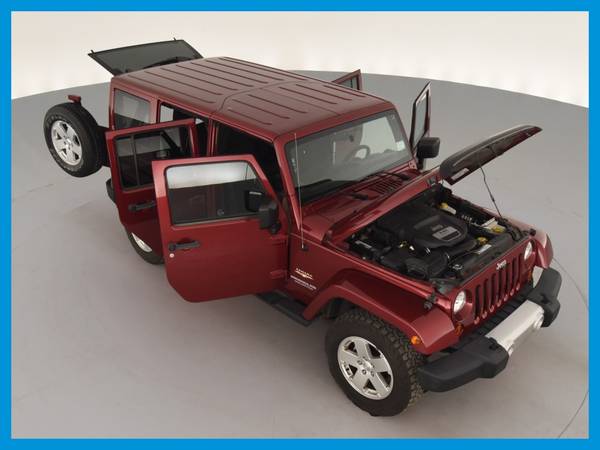 2012 Jeep Wrangler Unlimited Sahara Sport Utility 4D suv Red for sale in Cleveland, OH – photo 21