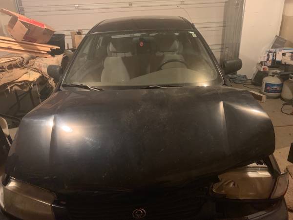 Damaged 1996 Mazda Protege LX for sale in Kennewick, WA – photo 2