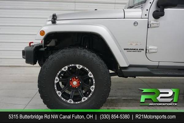 2012 Jeep Wrangler Unlimited Sahara 4WD Your TRUCK Headquarters! We for sale in Canal Fulton, PA – photo 5