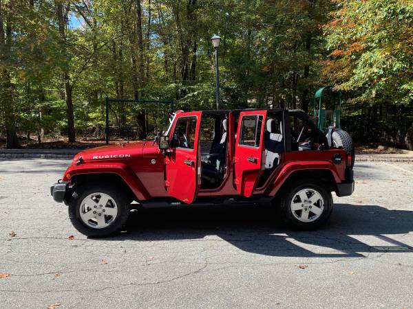 2012 Red Rock Jeep Wrangler Unlimited Sahara - cars & trucks - by... for sale in Pompton Plains, NJ – photo 13