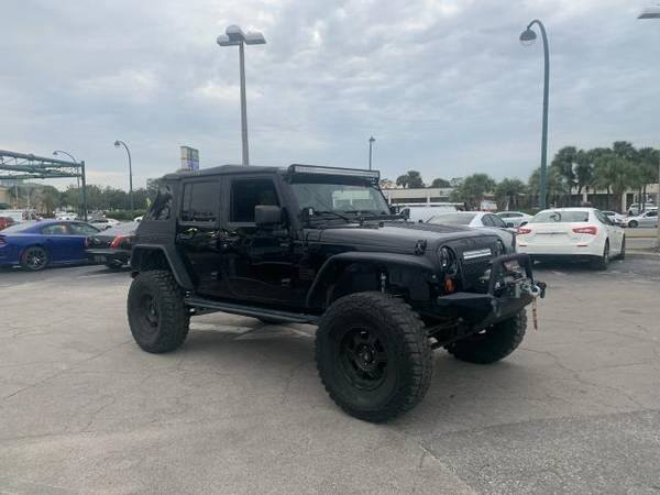 2012 Jeep Wrangler Unlimited Sahara 4WD - cars & trucks - by dealer... for sale in Orlando, FL – photo 3