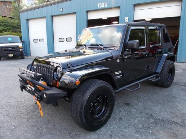 2012 Jeep Wrangler Unlimited 4WD 4dr Sahara - cars & trucks - by... for sale in Cohoes, AK – photo 3