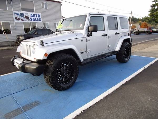 2012 Jeep Wrangler Unlimited Sahara - - by dealer for sale in Kelso, OR
